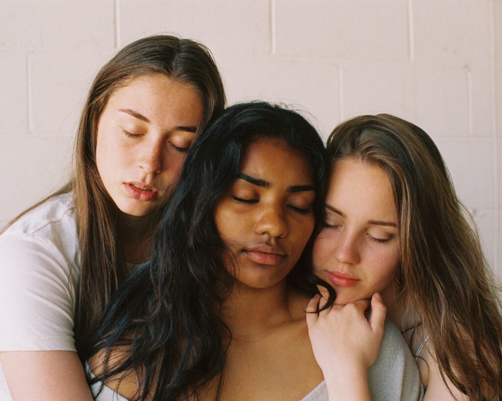 Three females from different race