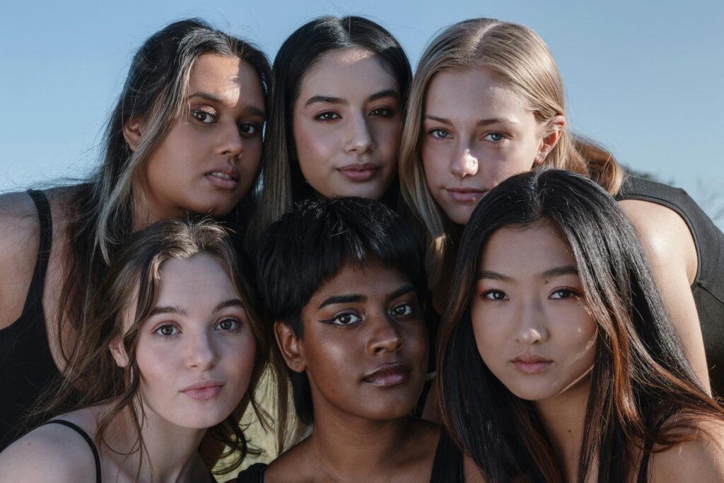 Women of different colors and race.